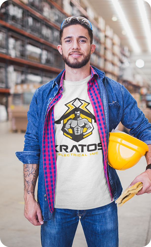 Kratos electrician standing in front of a warehouse, ready for professional electrical service
