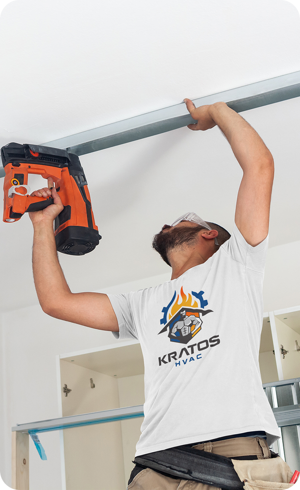 Kratos HVAC technician performing HVAC work on-site