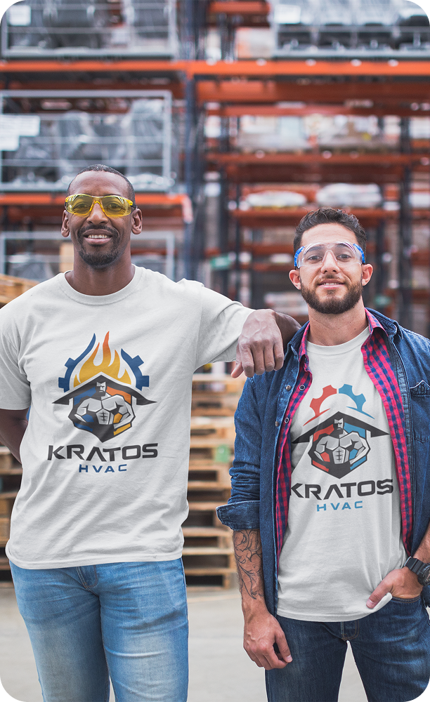 Two Kratos HVAC workers performing HVAC work inside a factory facility