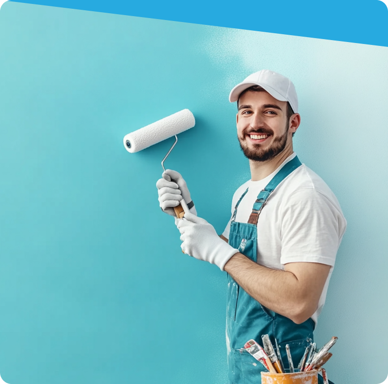 Kratos Painting worker applying blue paint to a wall