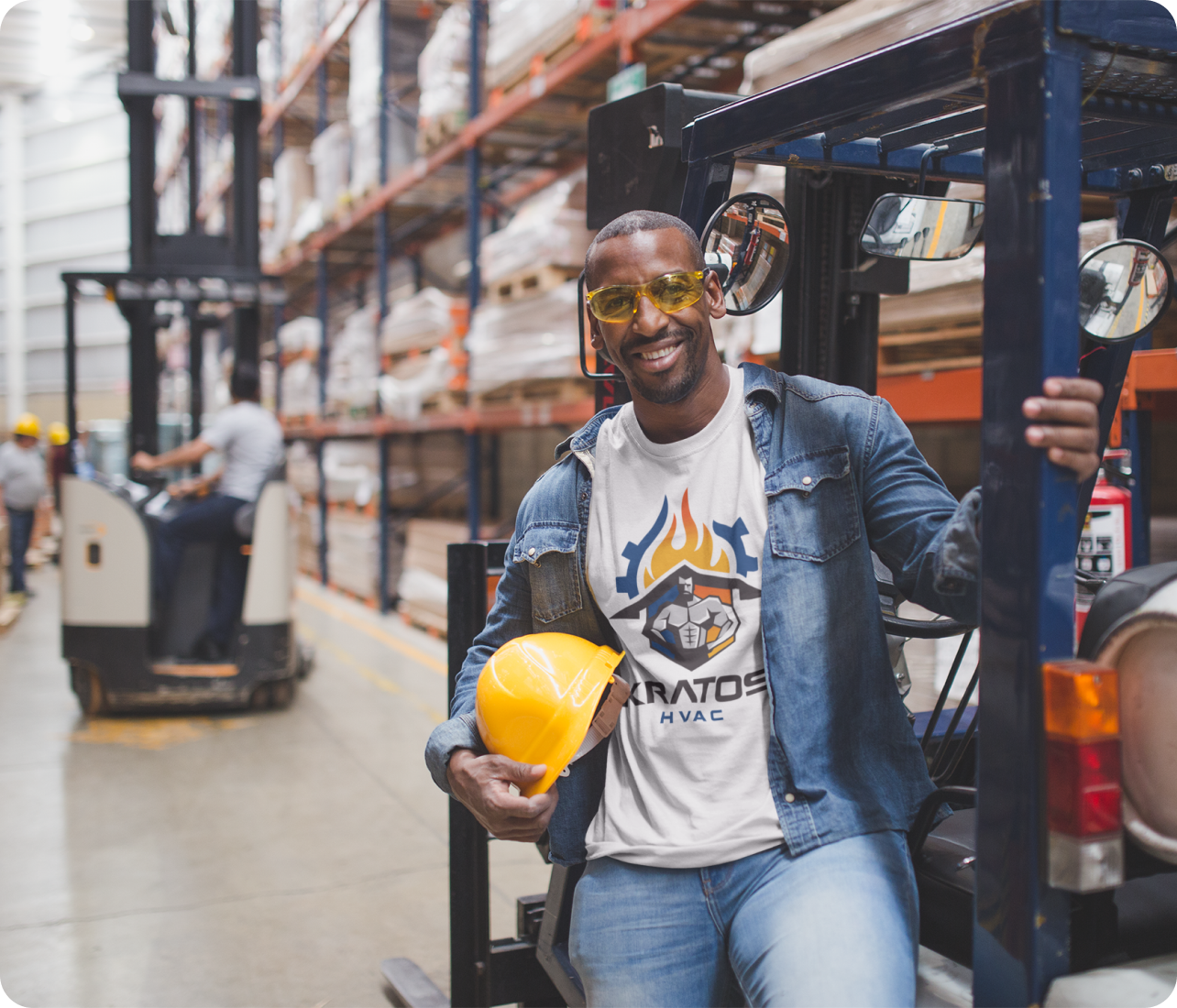 Kratos HVAC worker performing HVAC work inside a factory facility